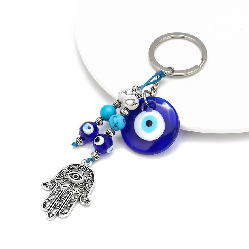 Blue evil eye and hand of Fatima keyring