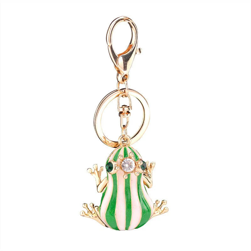 Gold tone crystal encrusted queen frog keyring