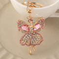 Gold tone pink crystal encrusted angel keyring