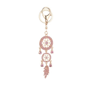 Silver tone dream catcher keyring with bead and feather detail