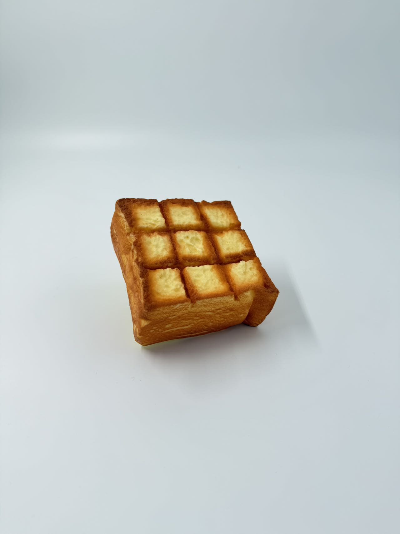 Grid bread loaf squishy toy