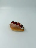 Strawberry croissant squishy toy